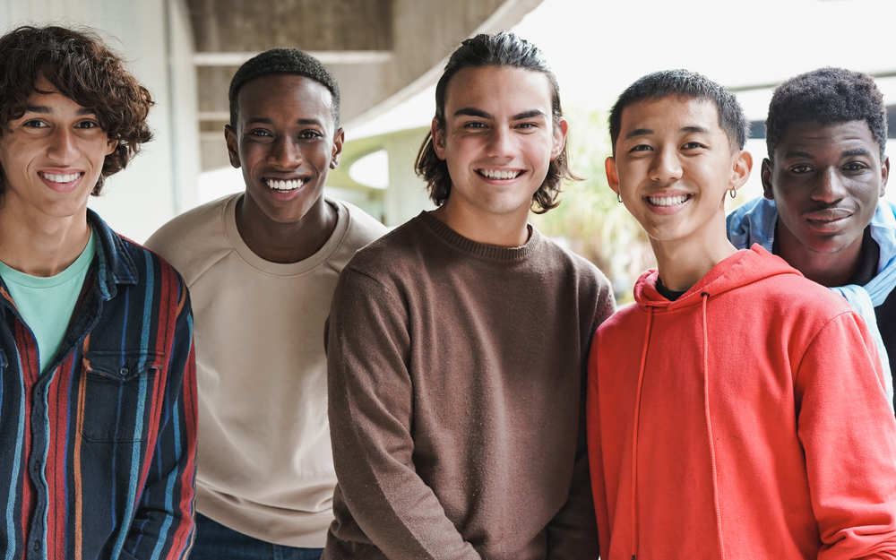 Group Of Happy Multiethnic Boys Smiling On Camera RHB3H6E